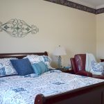 Room for relaxation in a comfortable bed and sitting chair
